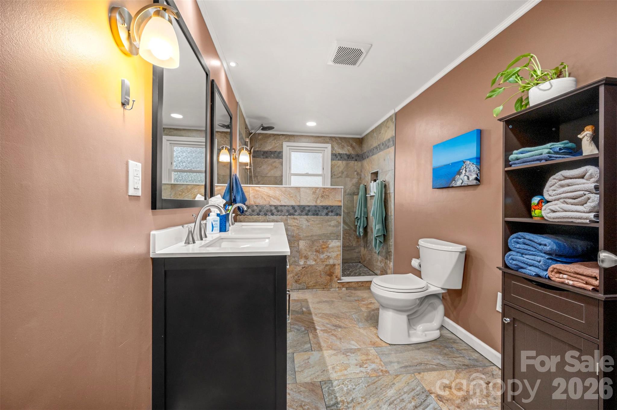 414 Sandy Run Church Road Mooresboro, NC 28114 - Photo 24 of 38 a bathroom with a toilet sink and mirror