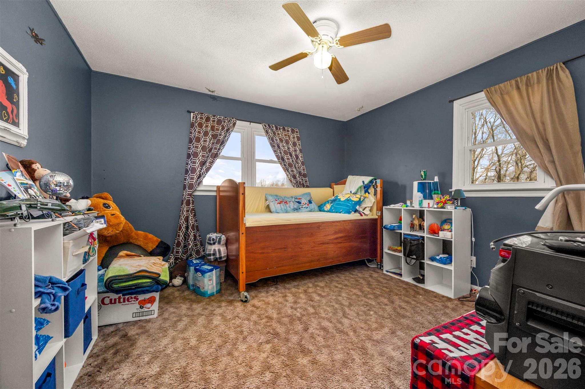 414 Sandy Run Church Road Mooresboro, NC 28114 - Photo 27 of 38 a bedroom with baby crib and a window