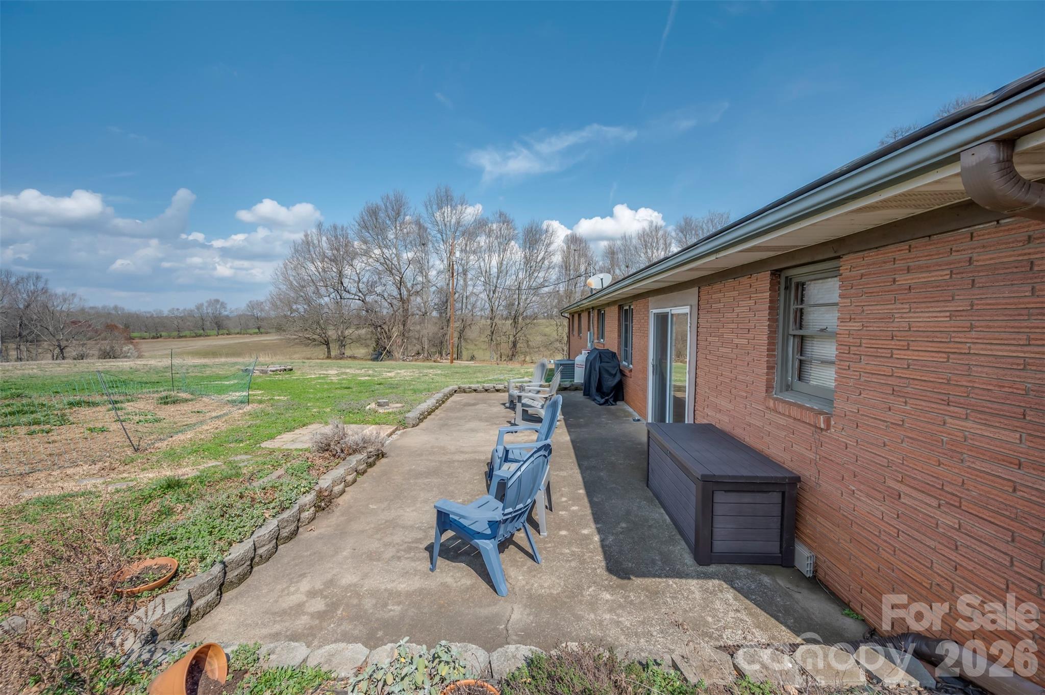414 Sandy Run Church Road Mooresboro, NC 28114 - Photo 29 of 38 a view of a patio with a yard