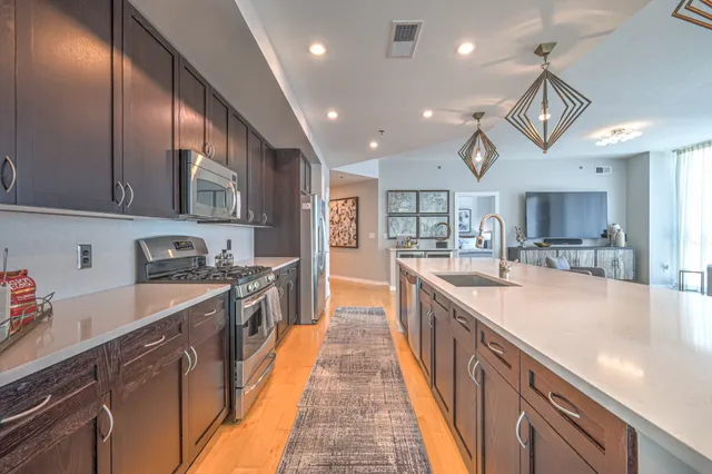a large kitchen with a large window