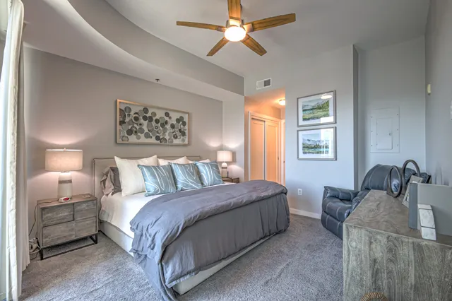 a bedroom with a bed furniture and window