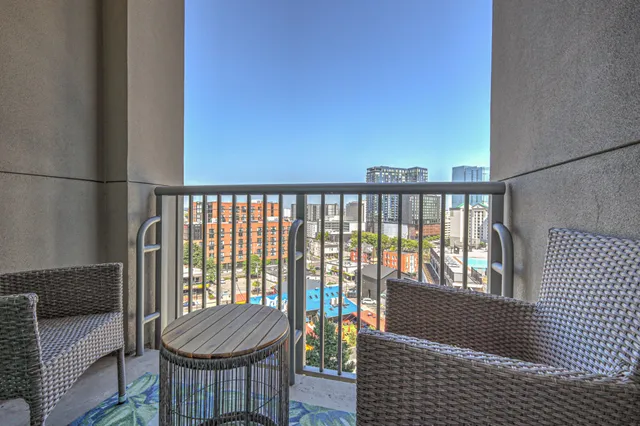 a en suite bathroom with a double vanity sink and a mirror