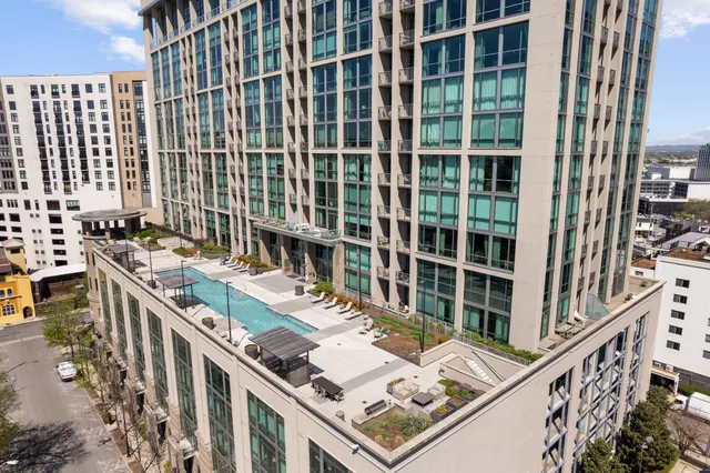 a view of a swimming pool with a lounge chairs