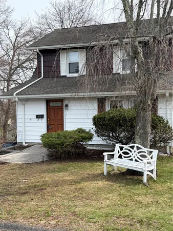 a view of a house with a garden