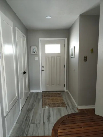 a view of hallway with walk in closet