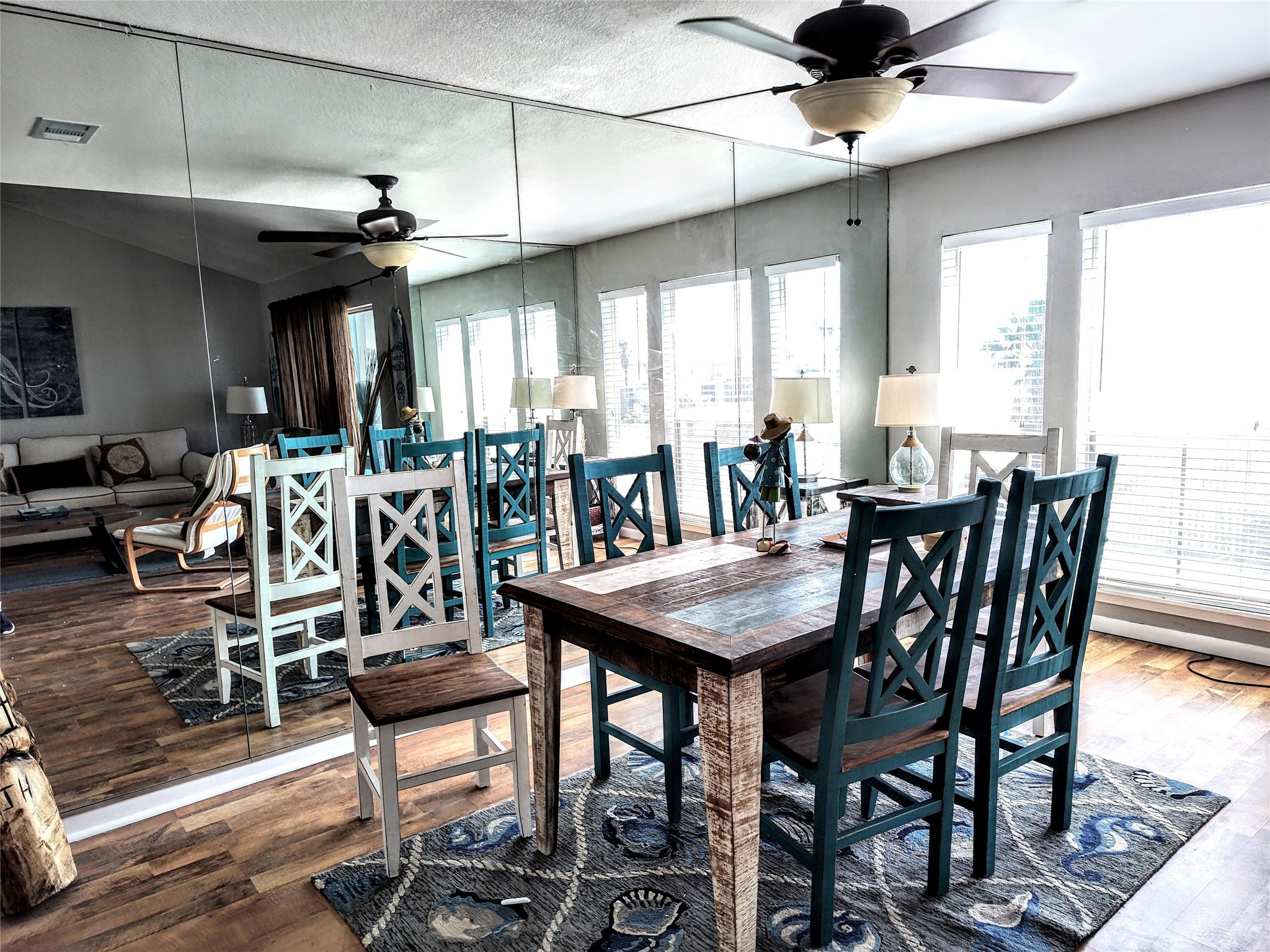 500 Tiki Drive, Unit 213 Tiki Island, TX 77554 - Photo 4 of 25 a view of a dining room with furniture