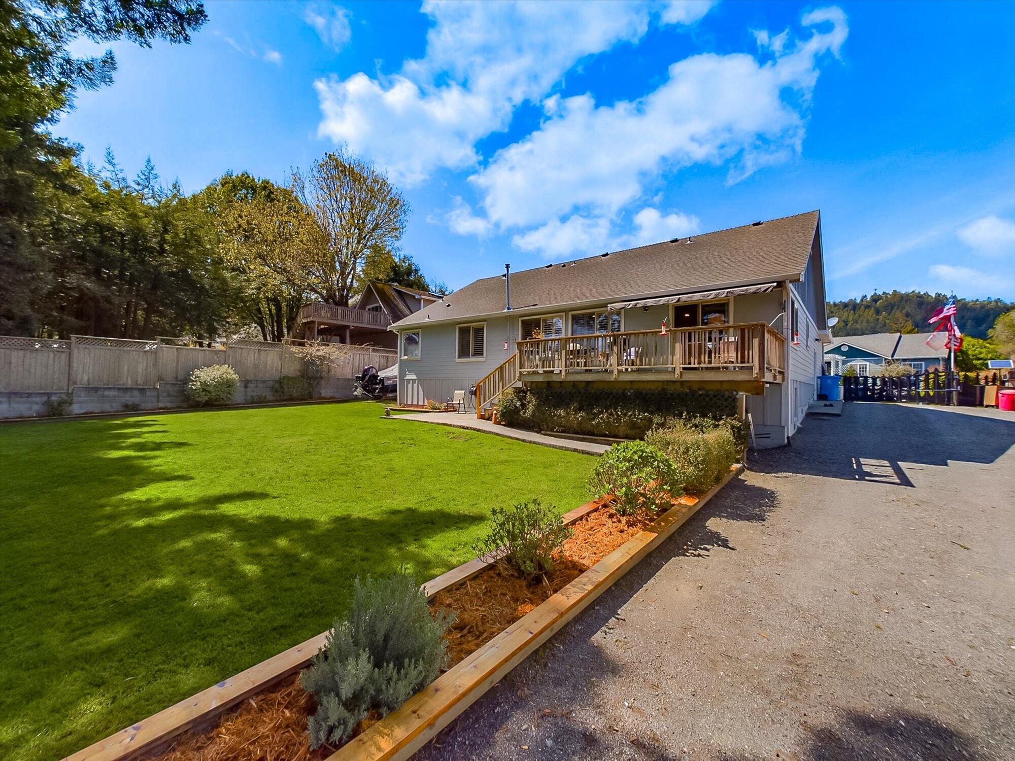 178 Grayland Heights Road Rio Dell, CA 95562 - Photo 41 of 52 a view of a house with a yard