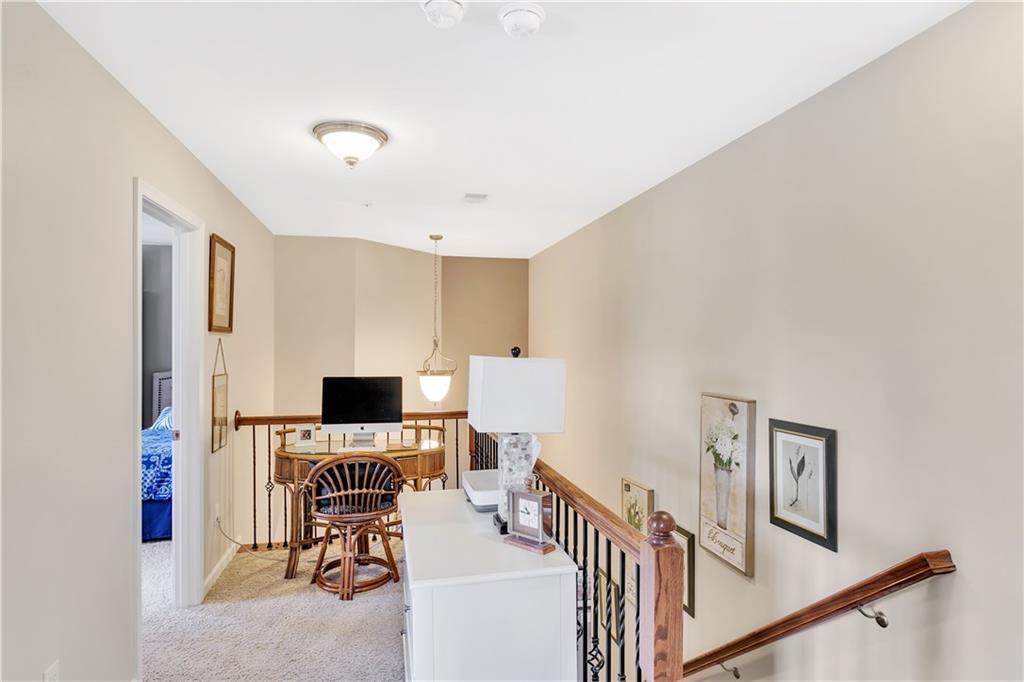 284 Maple Ridge Drive Canonsburg, PA 15317 - Photo 15 of 25 Upper level loft perfect for your desk, computer or hobby area overlooks the partially open lower level!