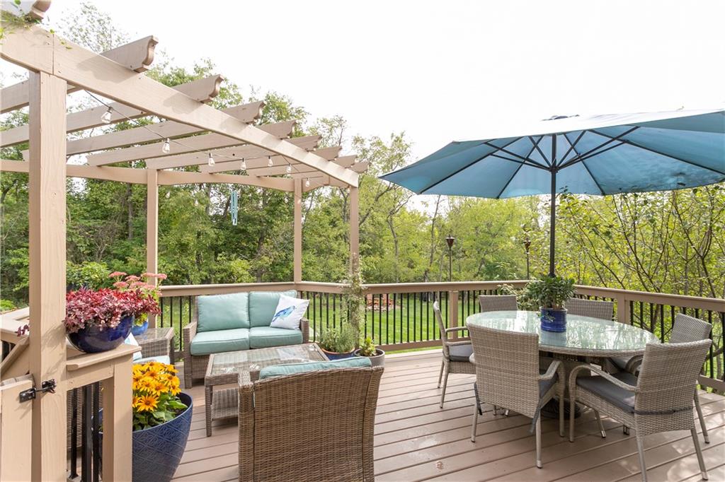 284 Maple Ridge Drive Canonsburg, PA 15317 - Photo 22 of 25 Let's enjoy the outdoors! 18x15 custom designed deck with pergola, gate & stairs to access the grilling area & fabulous level rear yard!