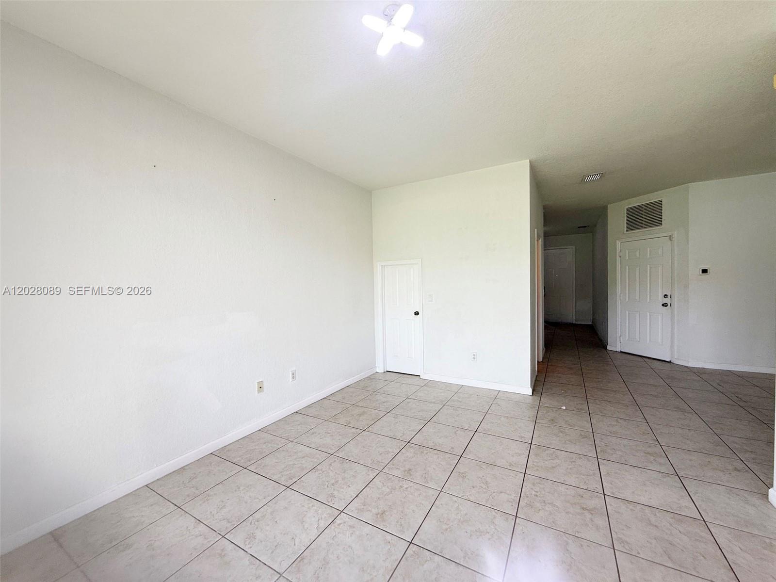 662 Northeast 21st Terrace Homestead, FL 33033 - Photo 32 of 34 a view of an empty room