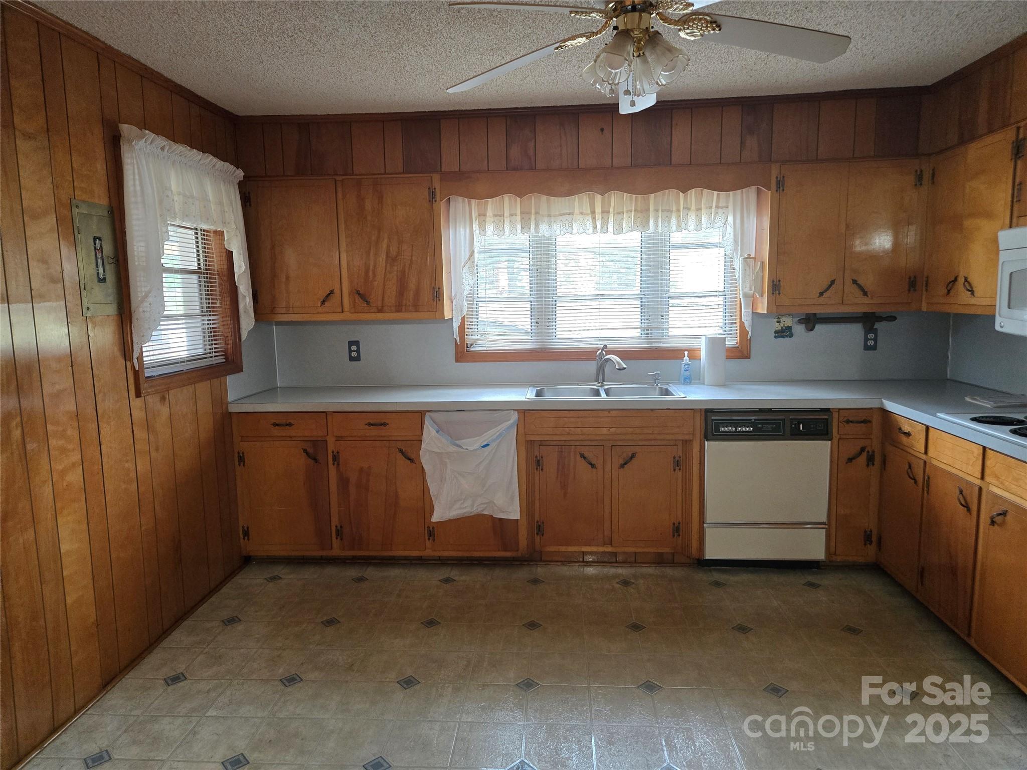 541 Old NC 277 Road Bessemer City, NC 28016 - Photo 14 of 26 a kitchen with a sink stove and cabinets