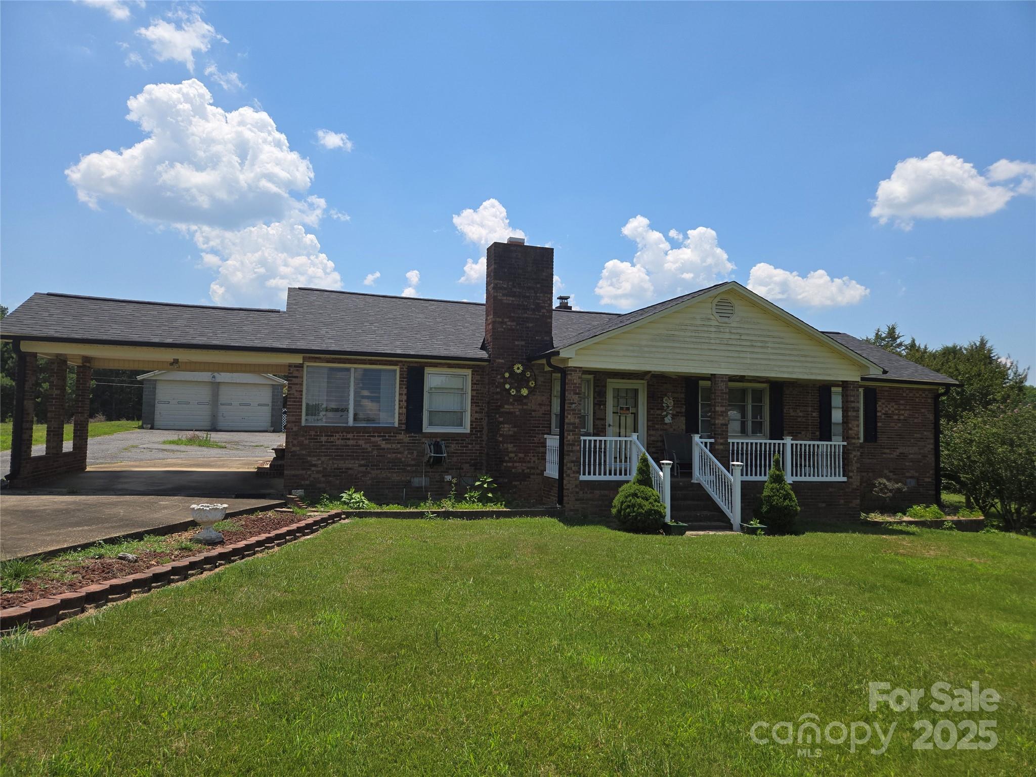 541 Old NC 277 Road Bessemer City, NC 28016 - Photo 16 of 26 a front view of a house with patio