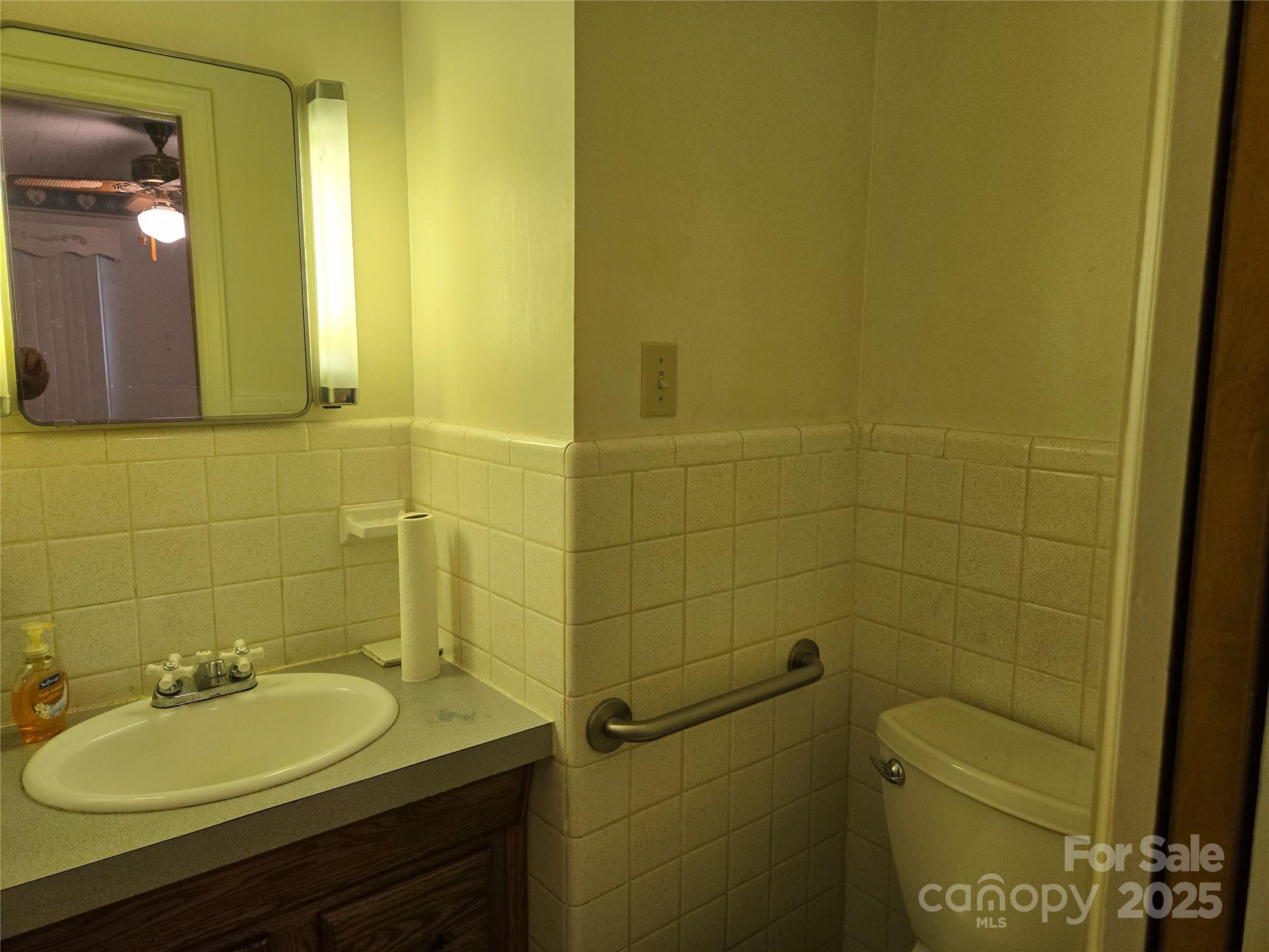 541 Old NC 277 Road Bessemer City, NC 28016 - Photo 24 of 26 a bathroom with a sink and a mirror