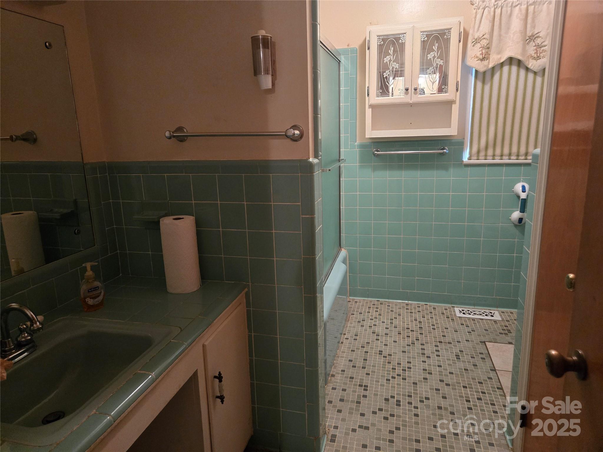 541 Old NC 277 Road Bessemer City, NC 28016 - Photo 25 of 26 a bathroom with a sink a toilet and shower