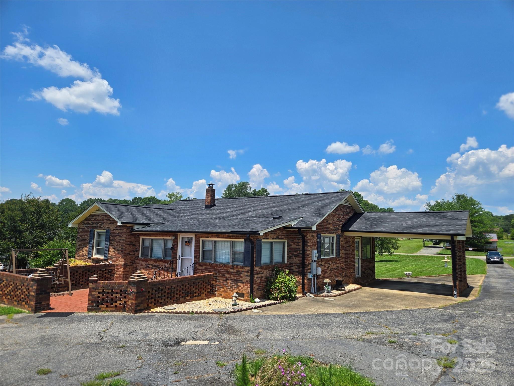 541 Old NC 277 Road Bessemer City, NC 28016 - Photo 4 of 26 a front view of a house with a porch
