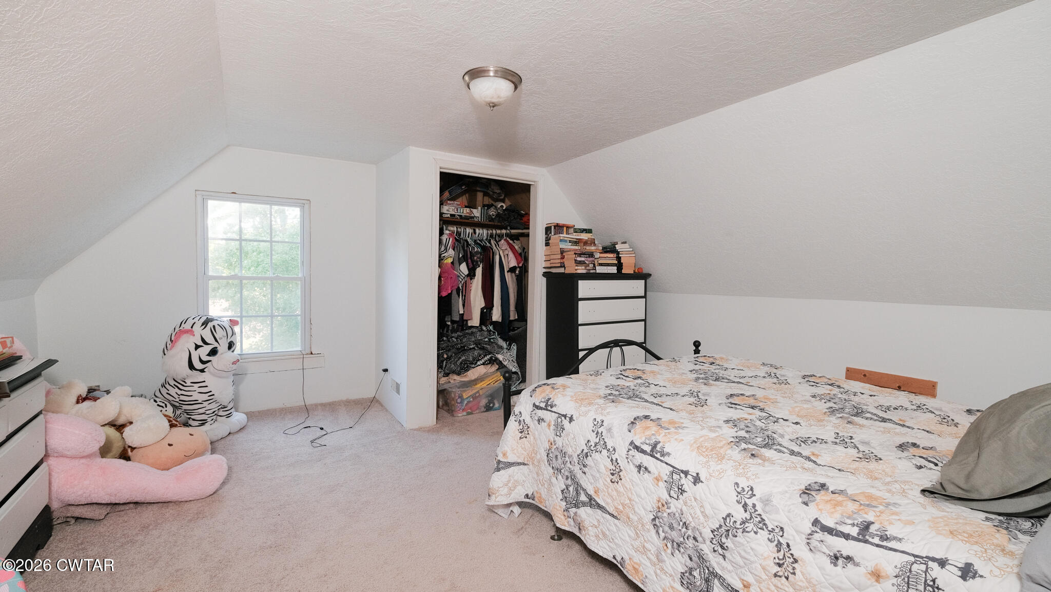 2636 Sidonia Road Sharon, TN 38255 - Photo 14 of 22 a bedroom with a bed and a couch