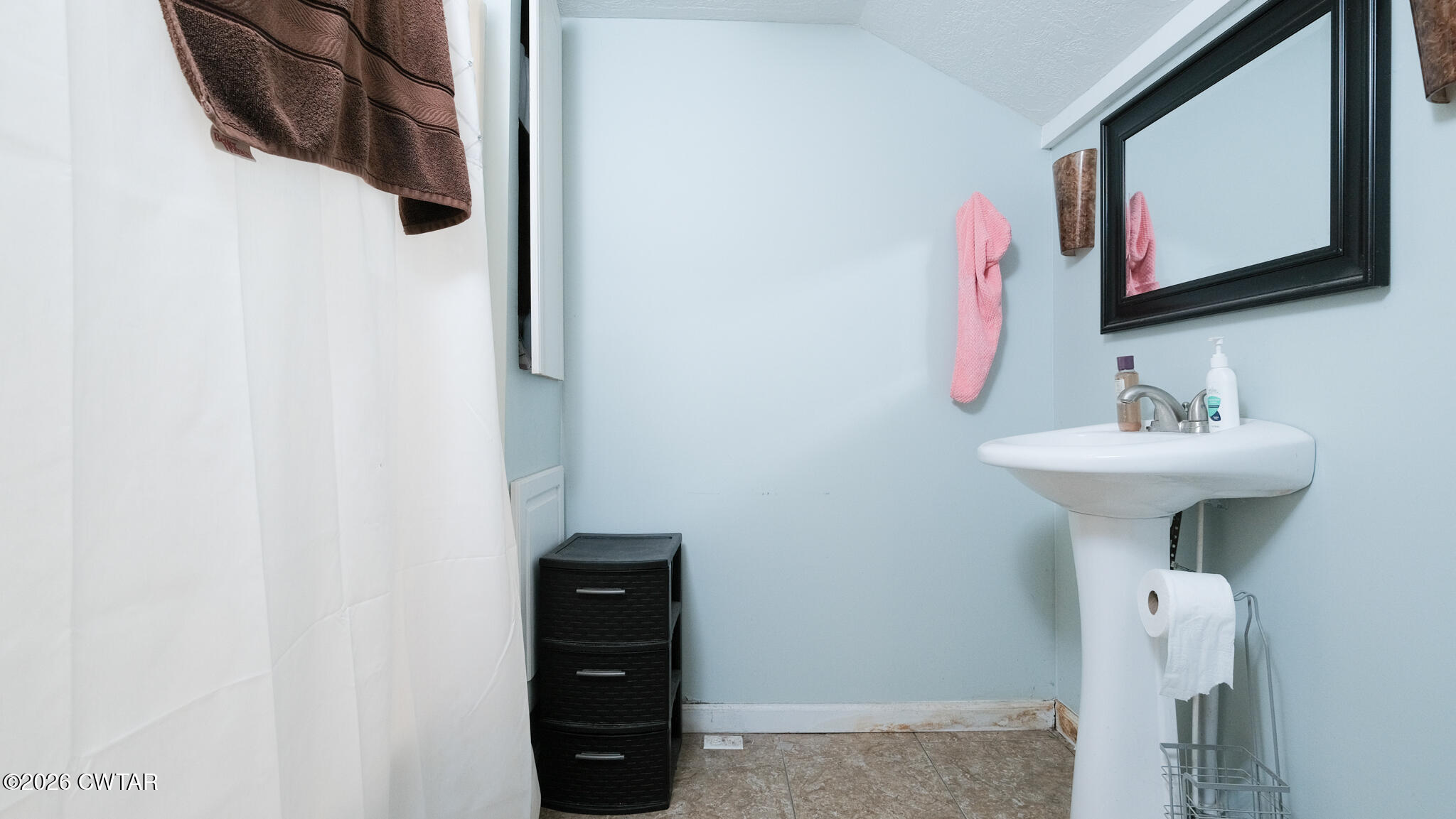 2636 Sidonia Road Sharon, TN 38255 - Photo 10 of 22 a bathroom with a sink and a mirror