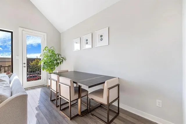 a workspace with furniture and a potted plant