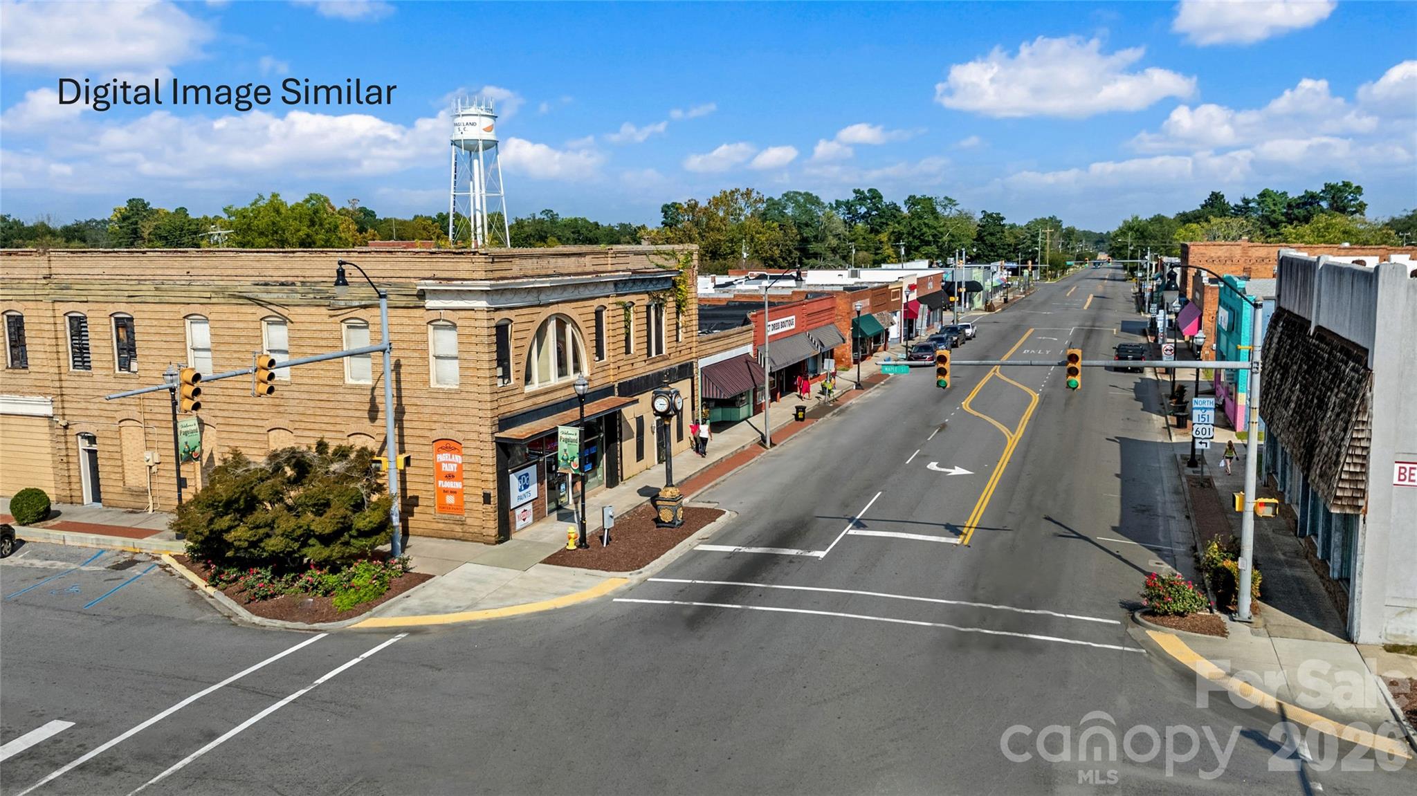 304 Maggys Way Pageland, SC 29728 - Photo 12 of 13 a view of a city with tall buildings