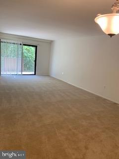 1003 Easton Road, Unit C502 Willow Grove, PA 19090 - Photo 2 of 13 an empty room with windows