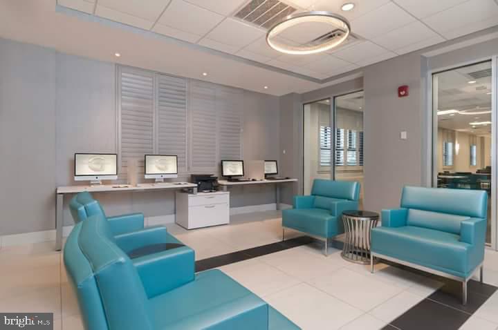 1003 Easton Road, Unit C502 Willow Grove, PA 19090 - Photo 11 of 13 a living room with furniture and a window