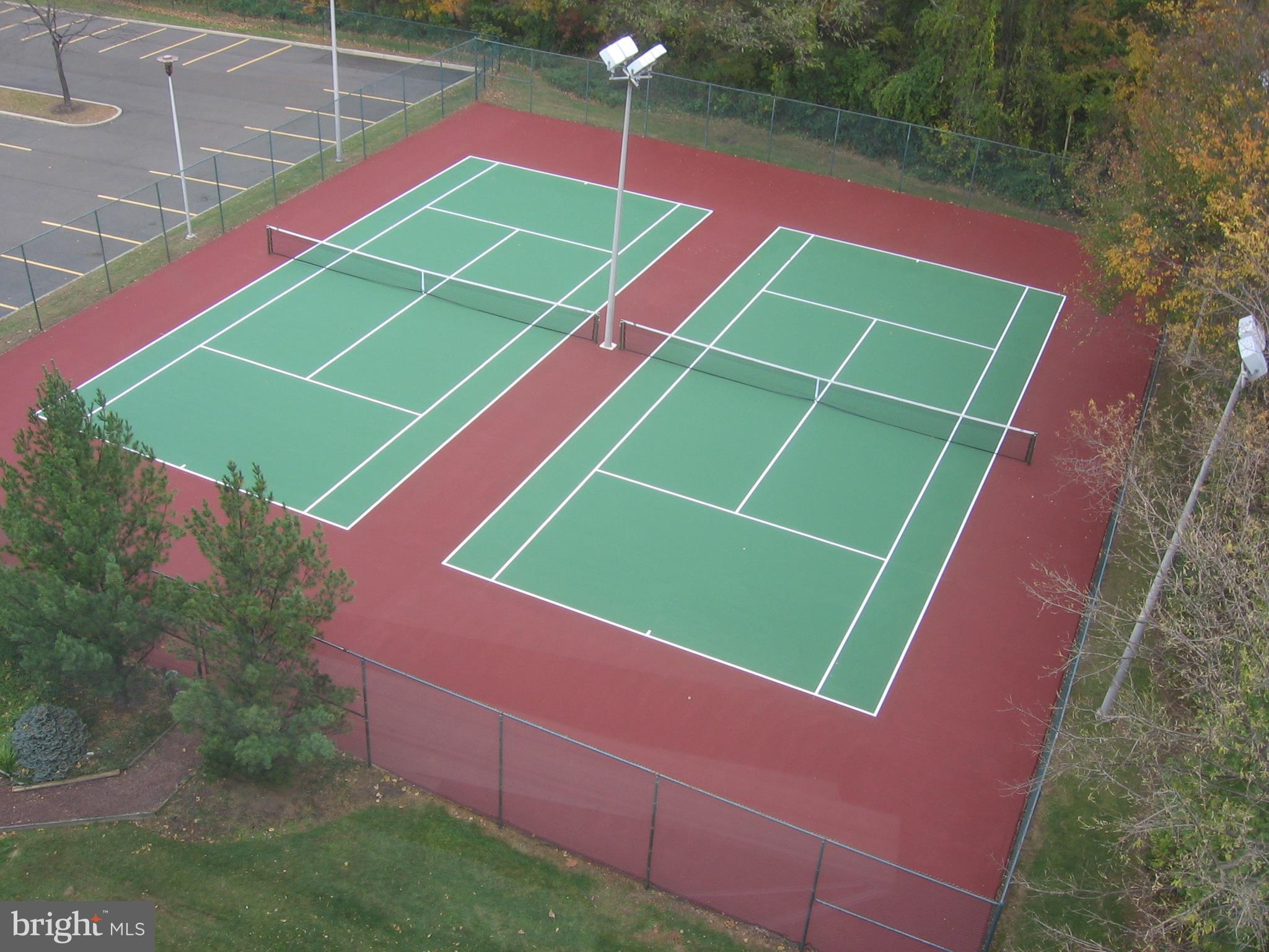1003 Easton Road, Unit C502 Willow Grove, PA 19090 - Photo 9 of 13 a tennis court that has tennis net