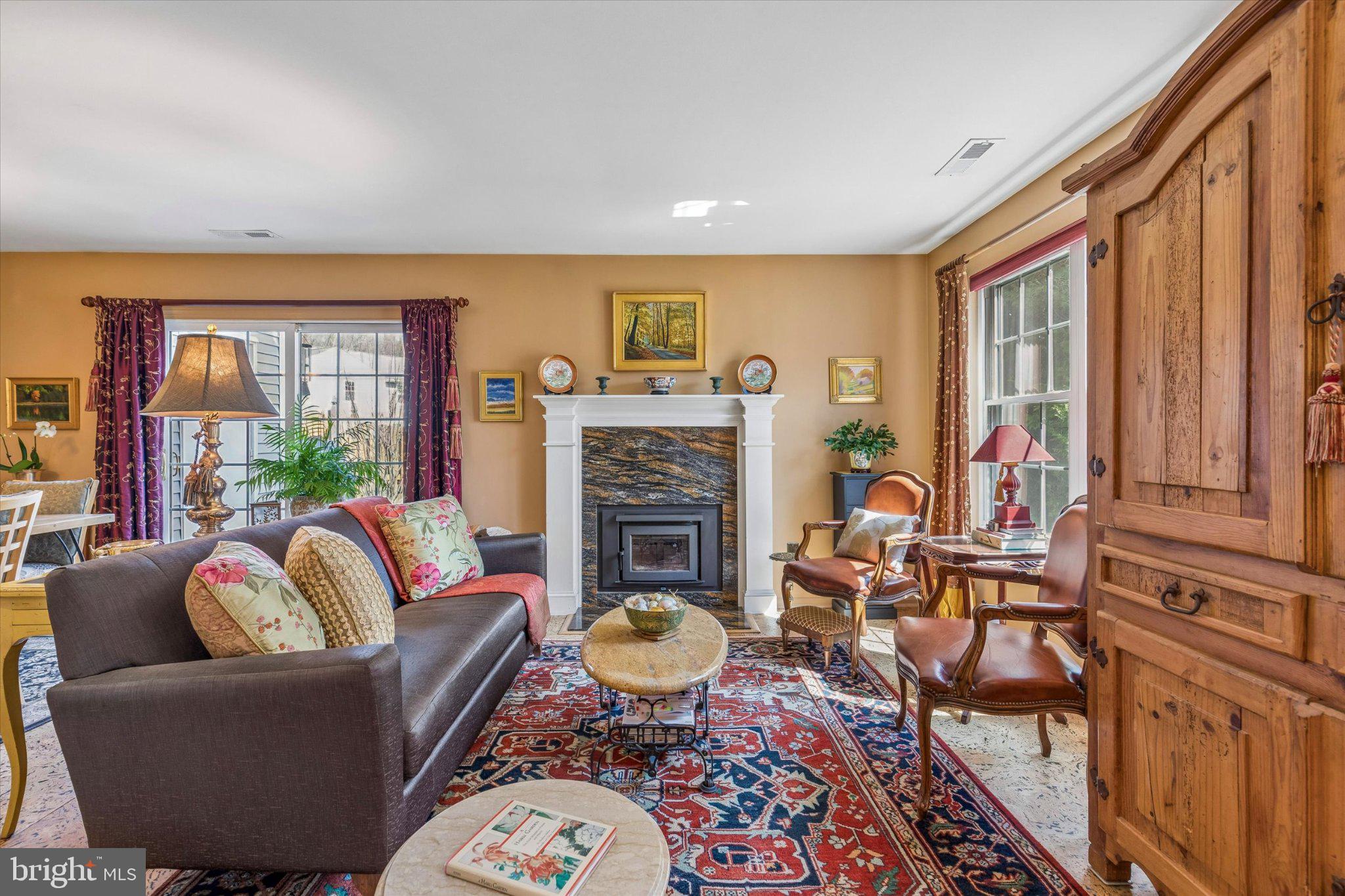 107 Carousel Circle Doylestown, PA 18901 - Photo 6 of 31 a living room with fireplace furniture and a window