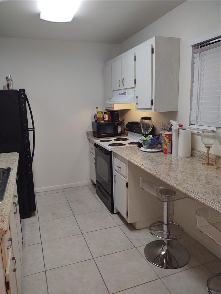 120 Northwest 70th Street, Unit 104 Boca Raton, FL 33487 - Photo 2 of 12 Kitchen