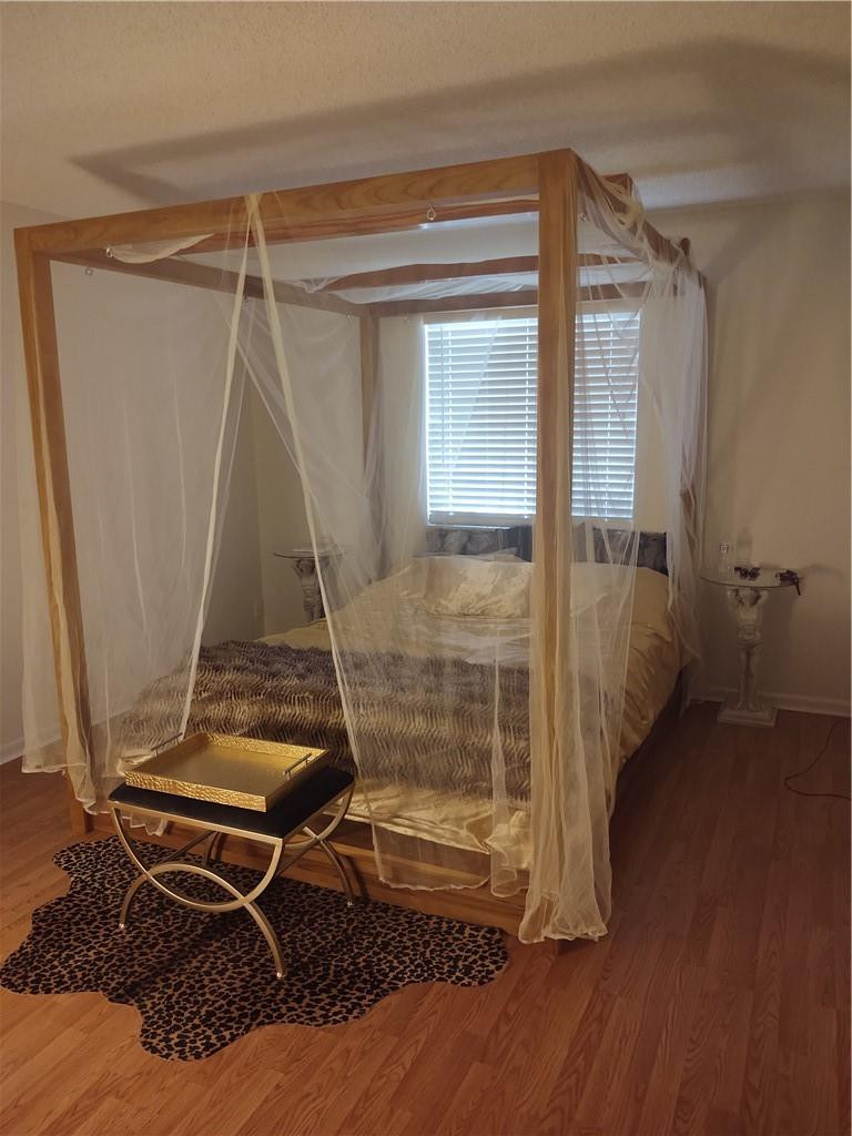 120 Northwest 70th Street, Unit 104 Boca Raton, FL 33487 - Photo 4 of 12 Master bedroom
