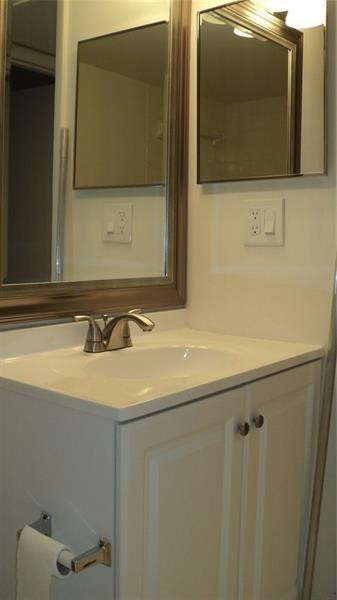 120 Northwest 70th Street, Unit 104 Boca Raton, FL 33487 - Photo 7 of 12 Guest Bathroom