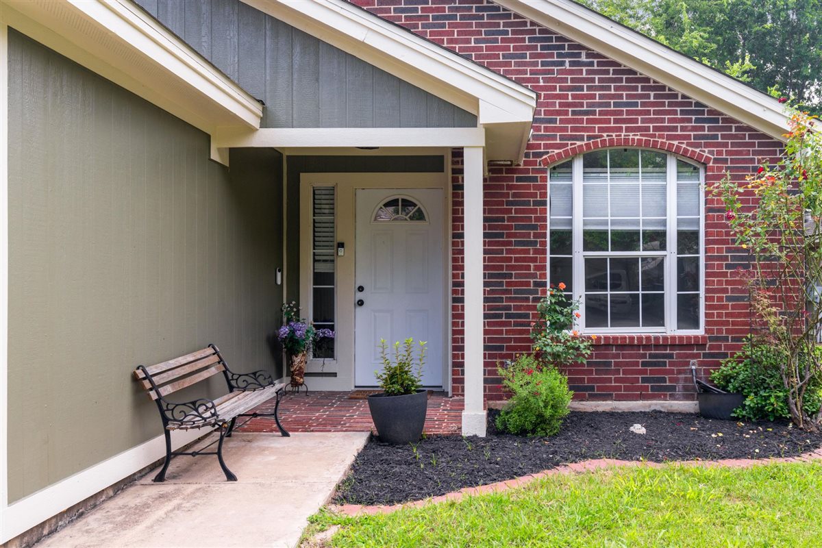 2147 Jasmine Path Round Rock, TX 78664 - Photo 2 of 36 The lush, landscaped front yard is level, well-maintained, and ready to enjoy.