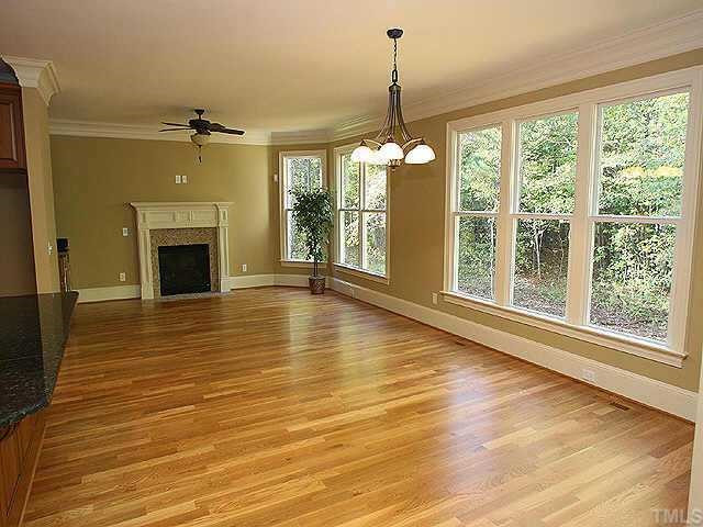 2416 Loring Court Raleigh, NC 27613 - Photo 5 of 10 Hearth room and breakfast room with warm fireplace open to kitchen. Other