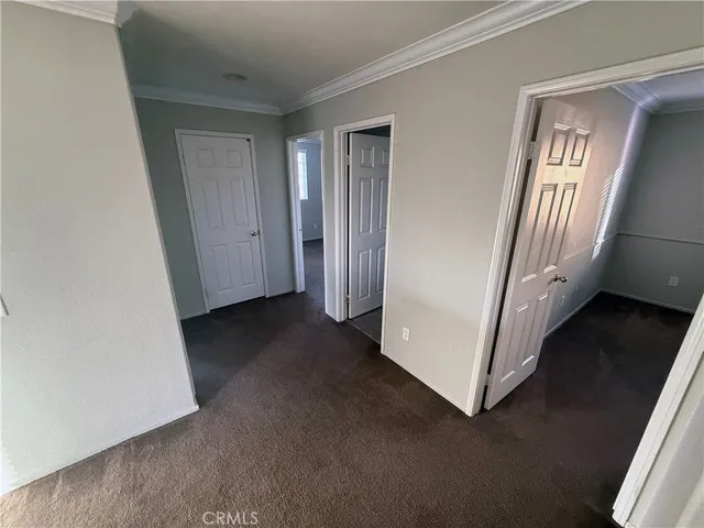 a view of a livingroom with a hallway