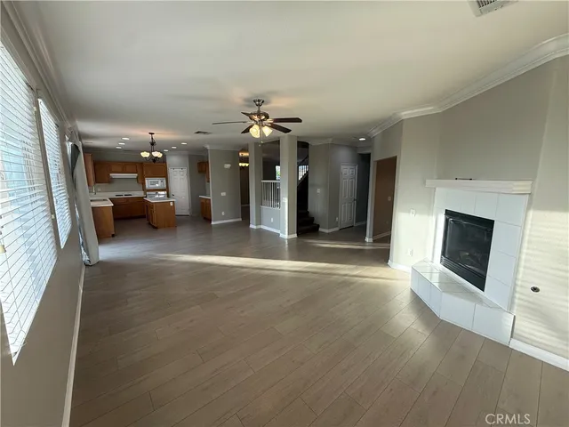 a view of a livingroom with furniture and a fireplace