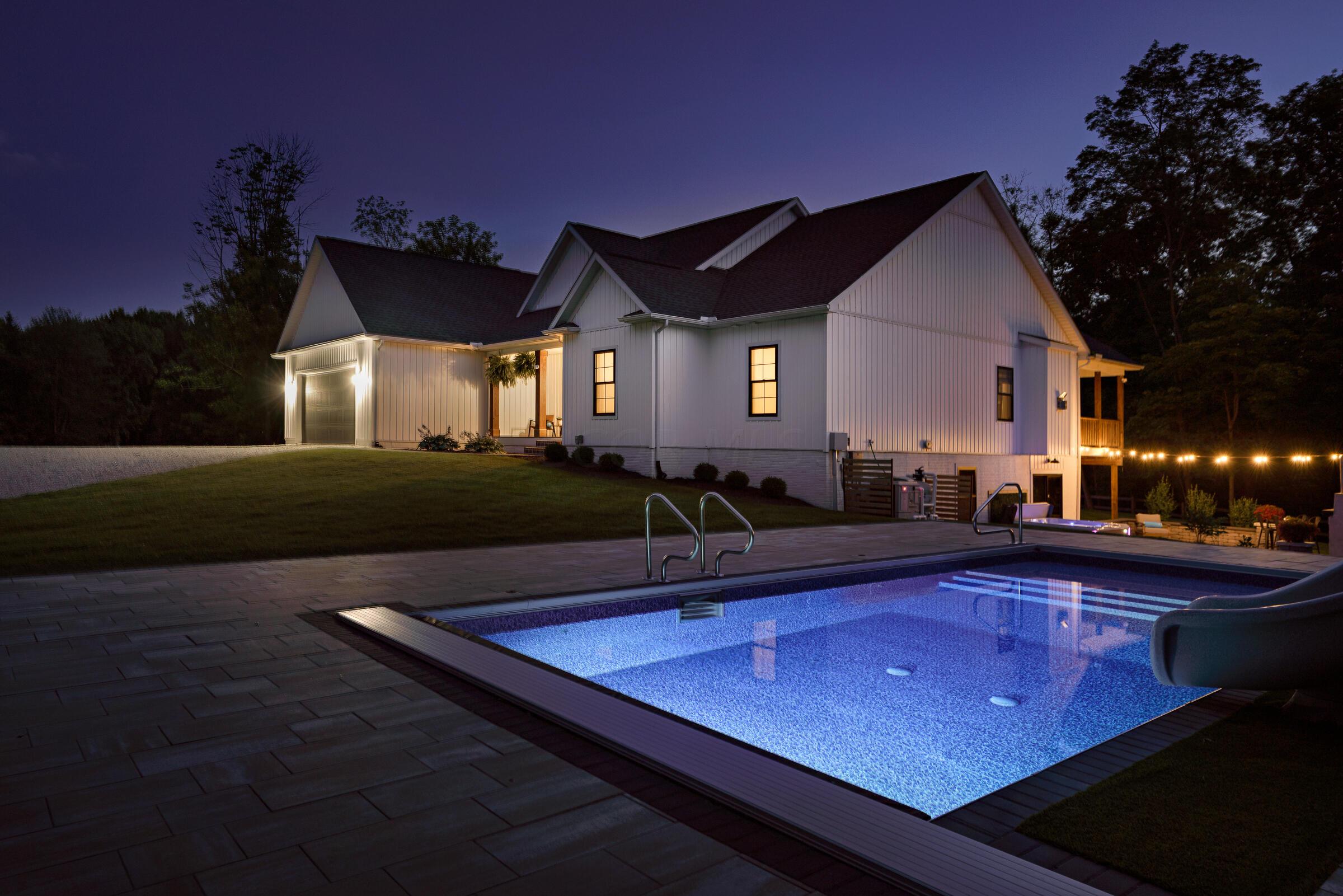 This spectacular property is an idyllic oasis in rural Ohio offering a private setting with attention to every detail! 5 BR, 3.1 BA, inground pool, HUGE pole barn & 5 Acres to live, work & play your way!