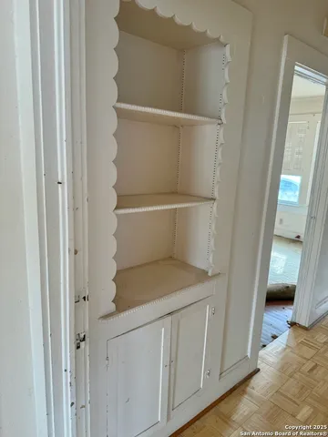 a view of a hallway with closet