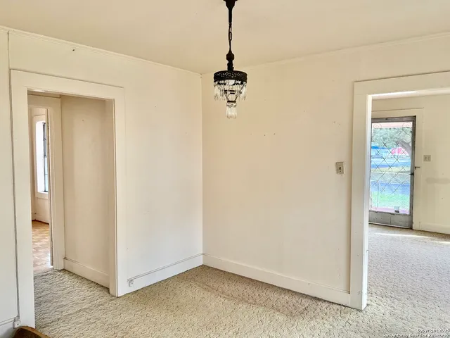 a bathroom with a sink a vanity and a mirror