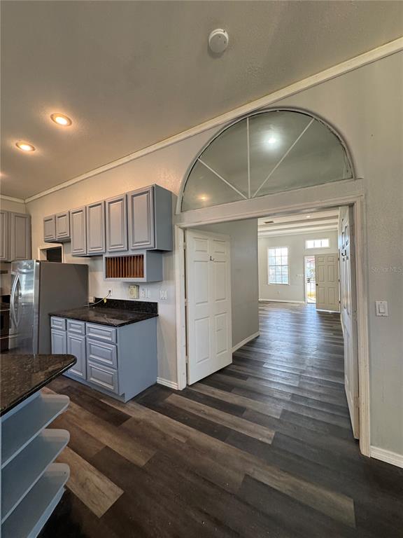 12349 Wasatch Court New Port Richey, FL 34654 - Photo 18 of 34 a open kitchen with stainless steel appliances granite countertop a sink and cabinets