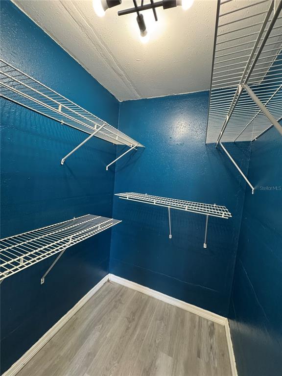 12349 Wasatch Court New Port Richey, FL 34654 - Photo 27 of 34 a view of a room with rack on the wall