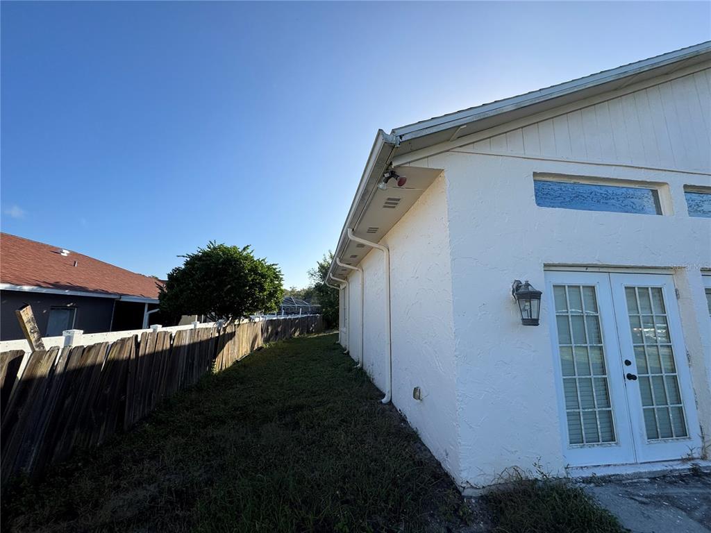12349 Wasatch Court New Port Richey, FL 34654 - Photo 4 of 34 a view of a house with backyard