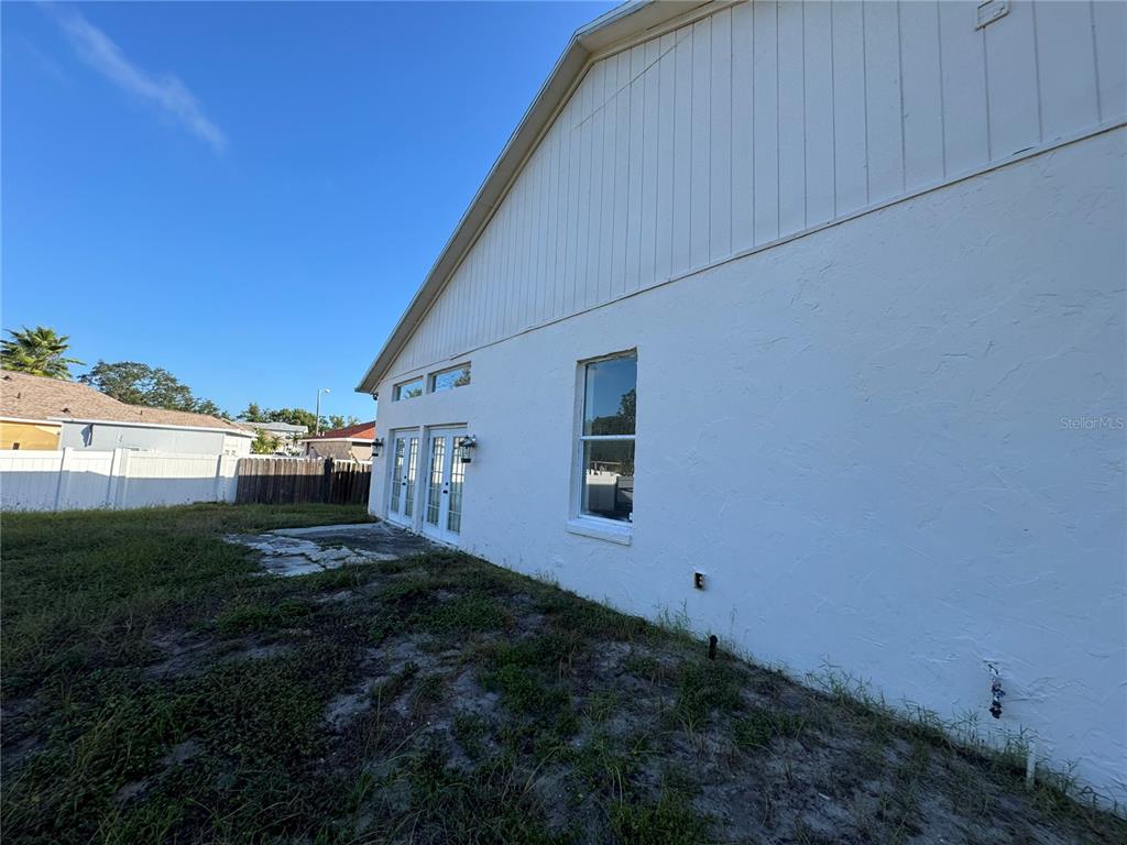 12349 Wasatch Court New Port Richey, FL 34654 - Photo 5 of 34 a house view with a backyard space