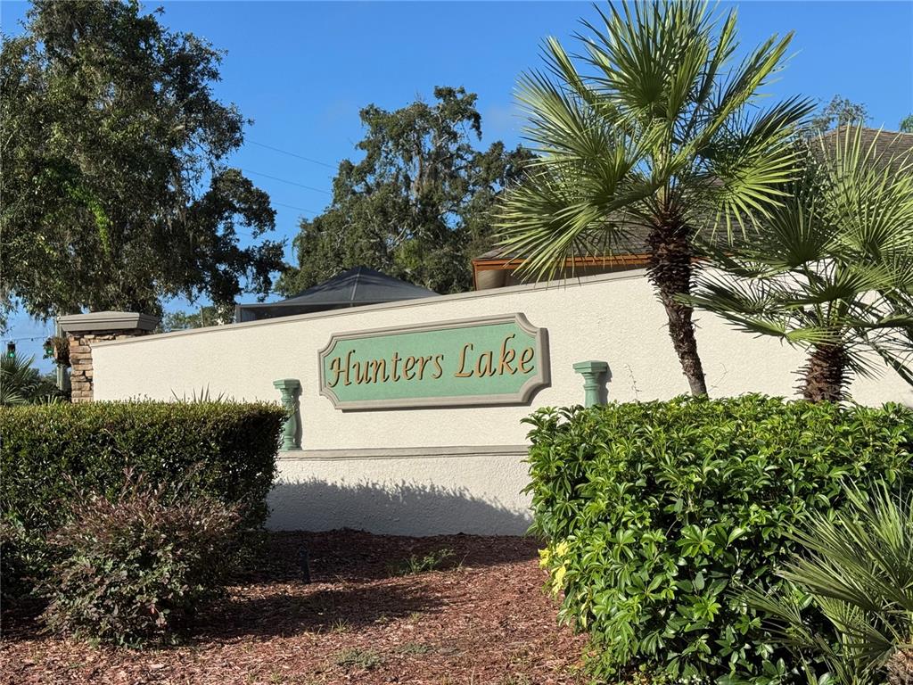 12349 Wasatch Court New Port Richey, FL 34654 - Photo 10 of 34 a sign that is sitting in front of a tree