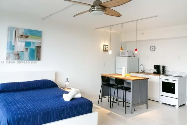 a workspace with furniture and wooden floor