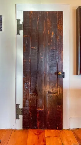 a bathroom with a tub and shower