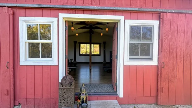 a view of front door of a house and a window