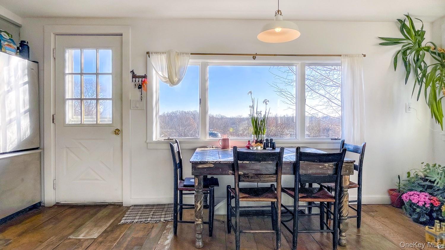 1201 Bruynswick Road Gardiner, NY 12525 - Photo 8 of 30 a view of a dining room with furniture and a window