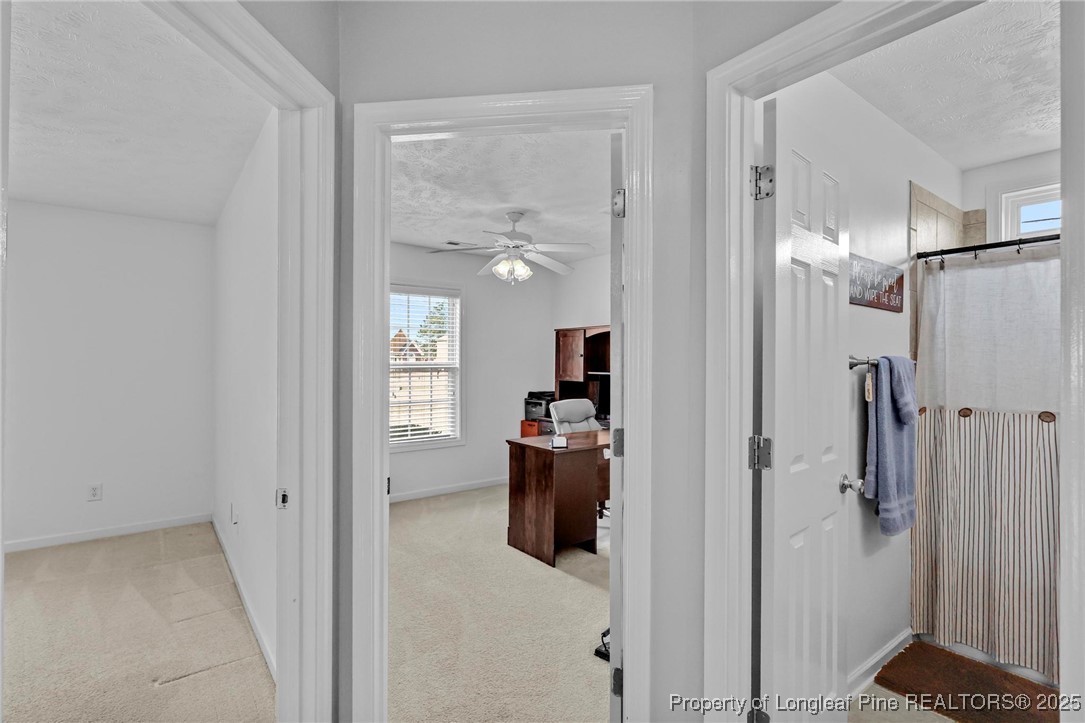 6657 Hillbrook Road Hope Mills, NC 28348 - Photo 25 of 50 a view of a kitchen from the hallway