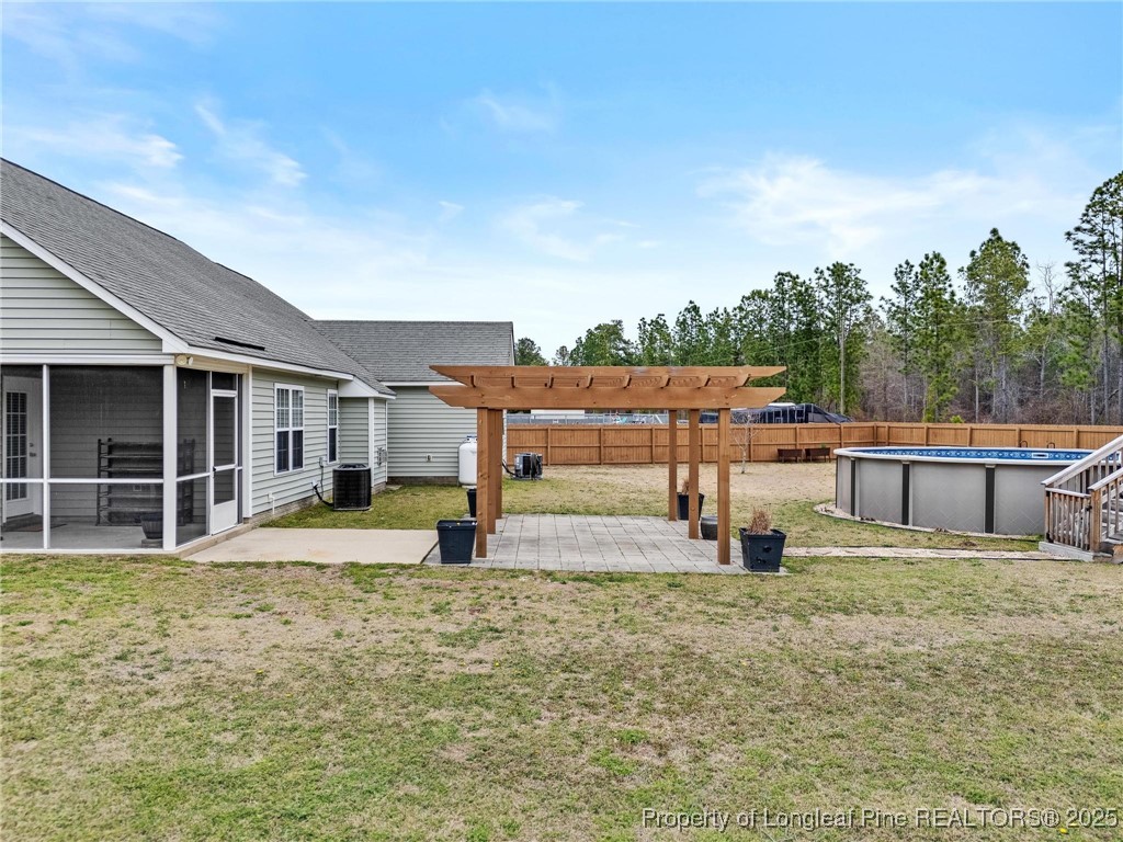 6657 Hillbrook Road Hope Mills, NC 28348 - Photo 39 of 50 a view of a house with backyard and sitting area