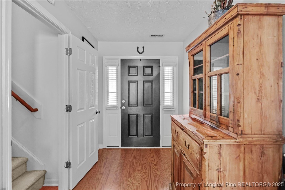 6657 Hillbrook Road Hope Mills, NC 28348 - Photo 4 of 50 a view of a hallway with windows