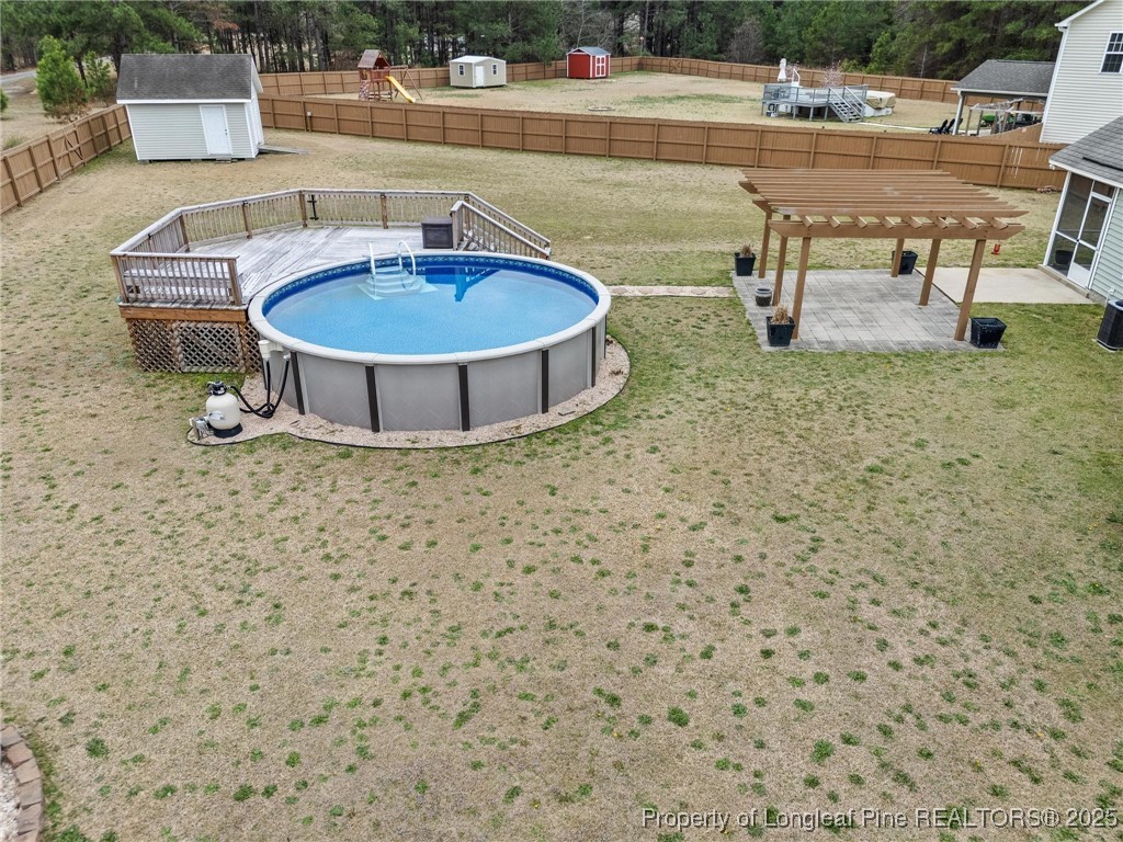 6657 Hillbrook Road Hope Mills, NC 28348 - Photo 42 of 50 swimming pool view with a seating space